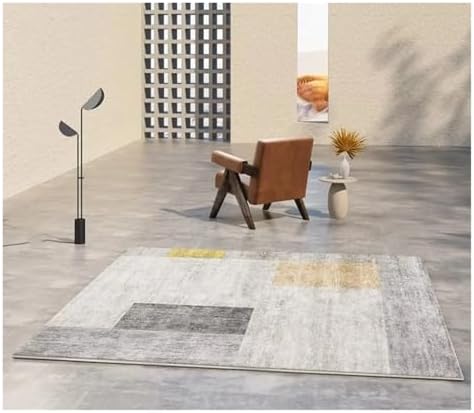 Abstrakter grauer Wohnzimmerteppich, modern und rutschfest, für stilvolle Inneneinrichtung.